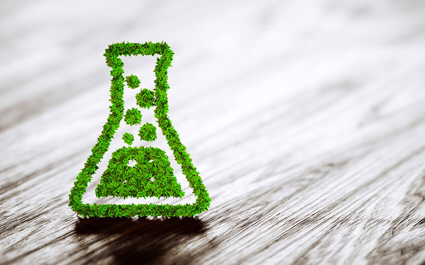 Illustration of a green grass liquid bottle to symbolize environmentally friendly coatings